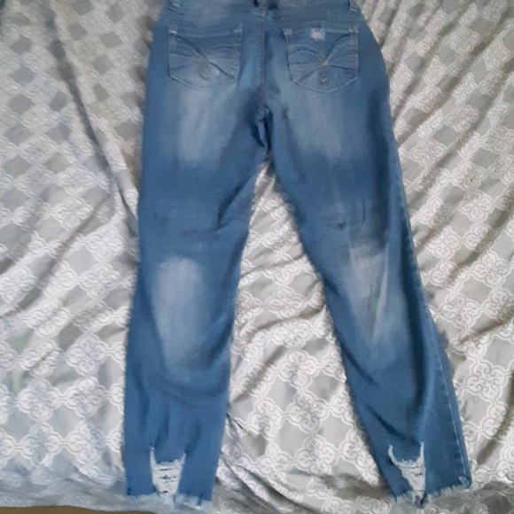 I'm selling a pair of slightly ripped jeans - Picture 2 of 2